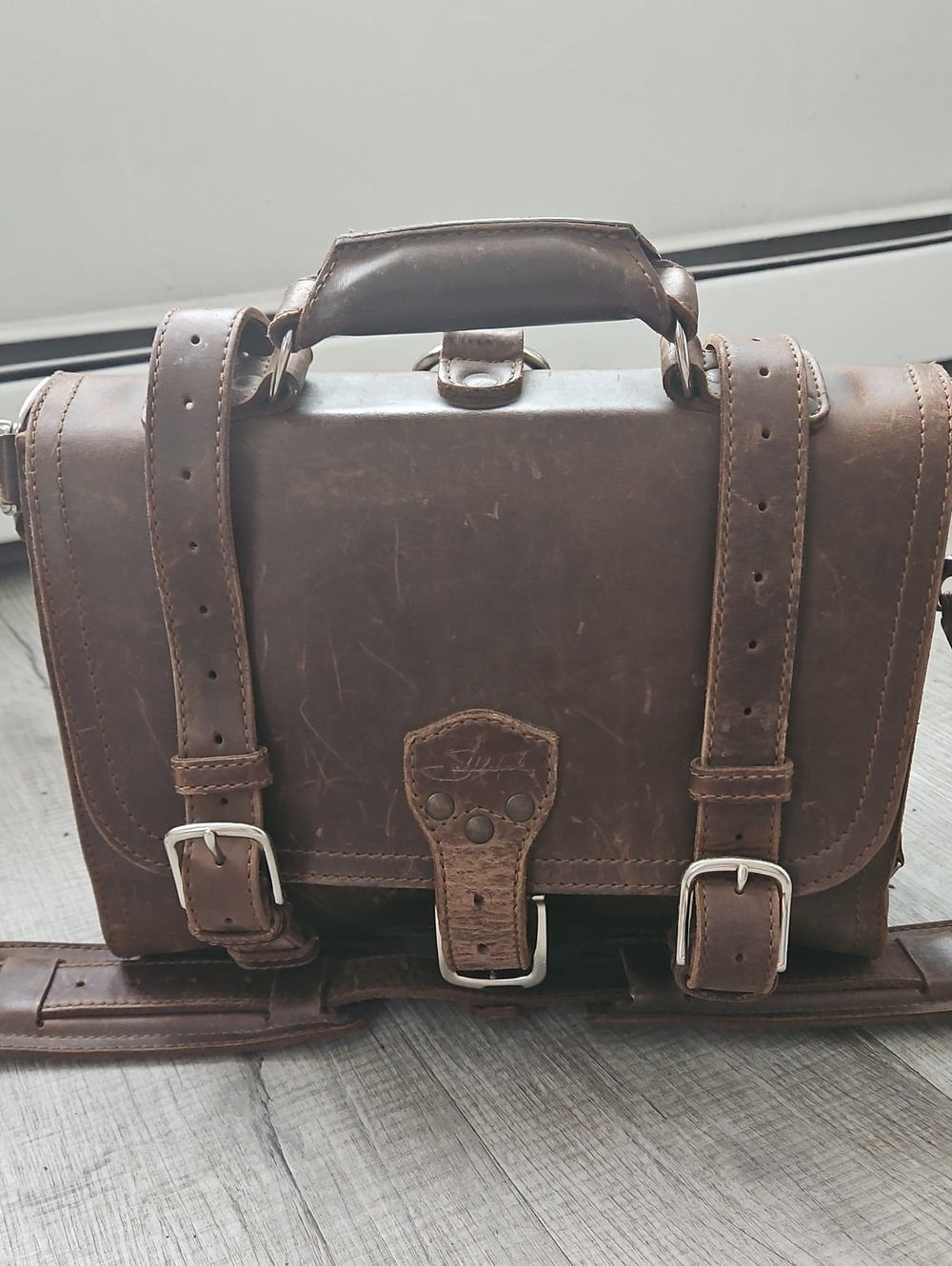 Saddleback Leathers Convertible Briefcase/Backpack With Adjustable Straps.